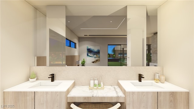 bathroom featuring vanity and decorative backsplash