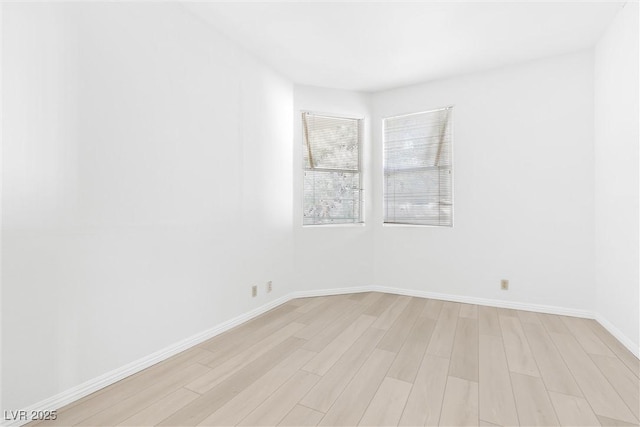 empty room featuring light hardwood / wood-style floors