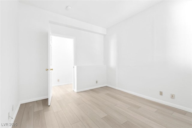 unfurnished room featuring light hardwood / wood-style flooring