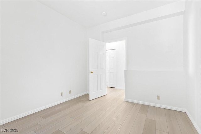 unfurnished room featuring light hardwood / wood-style floors