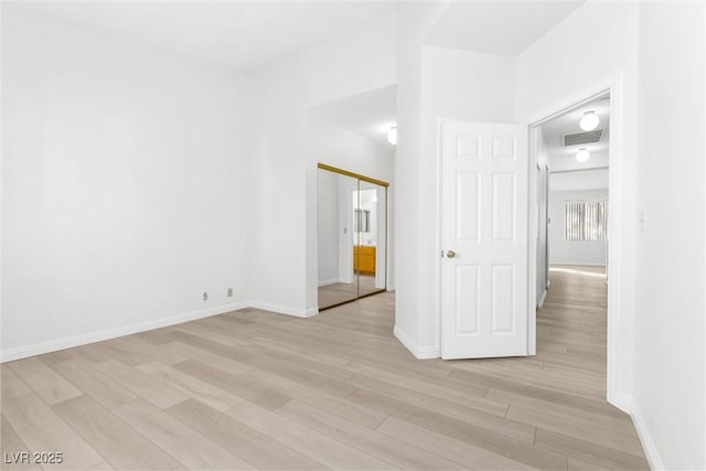 empty room featuring light hardwood / wood-style flooring