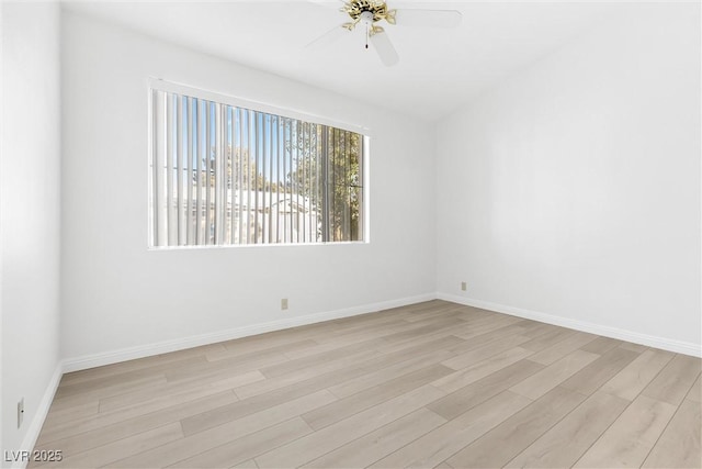 unfurnished room featuring ceiling fan and light wood-type flooring