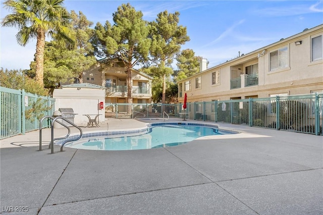 view of pool featuring a patio area