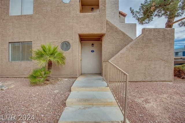 2983 Juniper Hills Blvd Unit 102, Las Vegas, NV 89142 - view of exterior entry featuring stucco siding