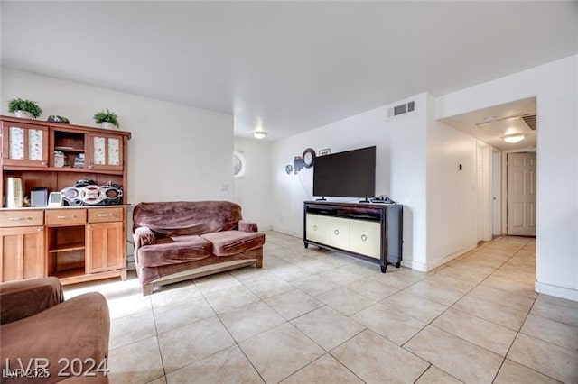 living room featuring light tile patterned flooring