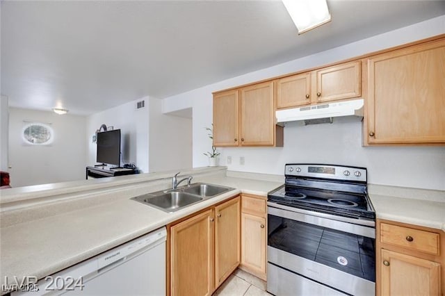 kitchen featuring sink, light tile patterned floors, light brown cabinets, electric range, and dishwasher