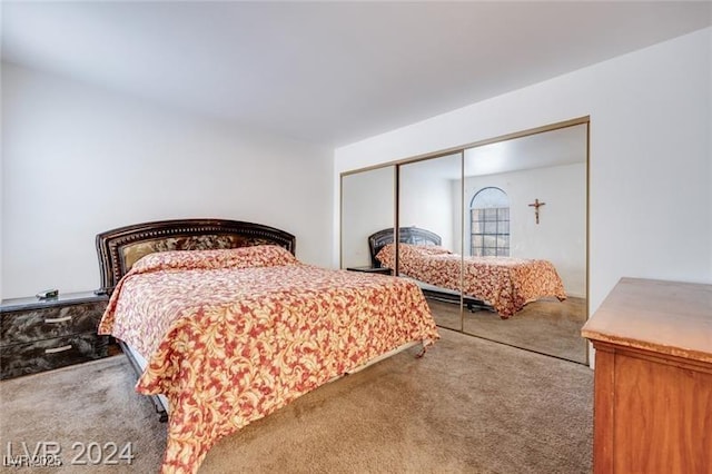 carpeted bedroom with a closet