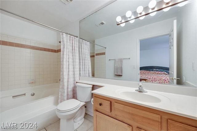 full bathroom featuring vanity, shower / tub combo, tile patterned floors, and toilet