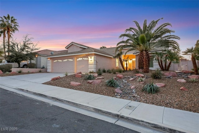 view of front of home with a garage