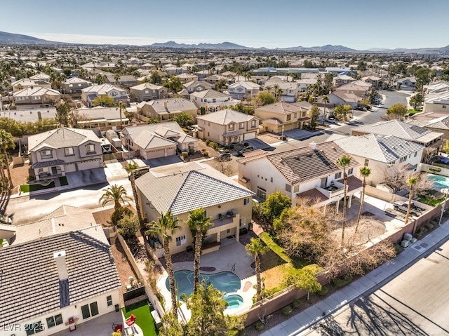 bird's eye view with a mountain view