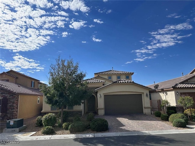 view of front of home with a garage