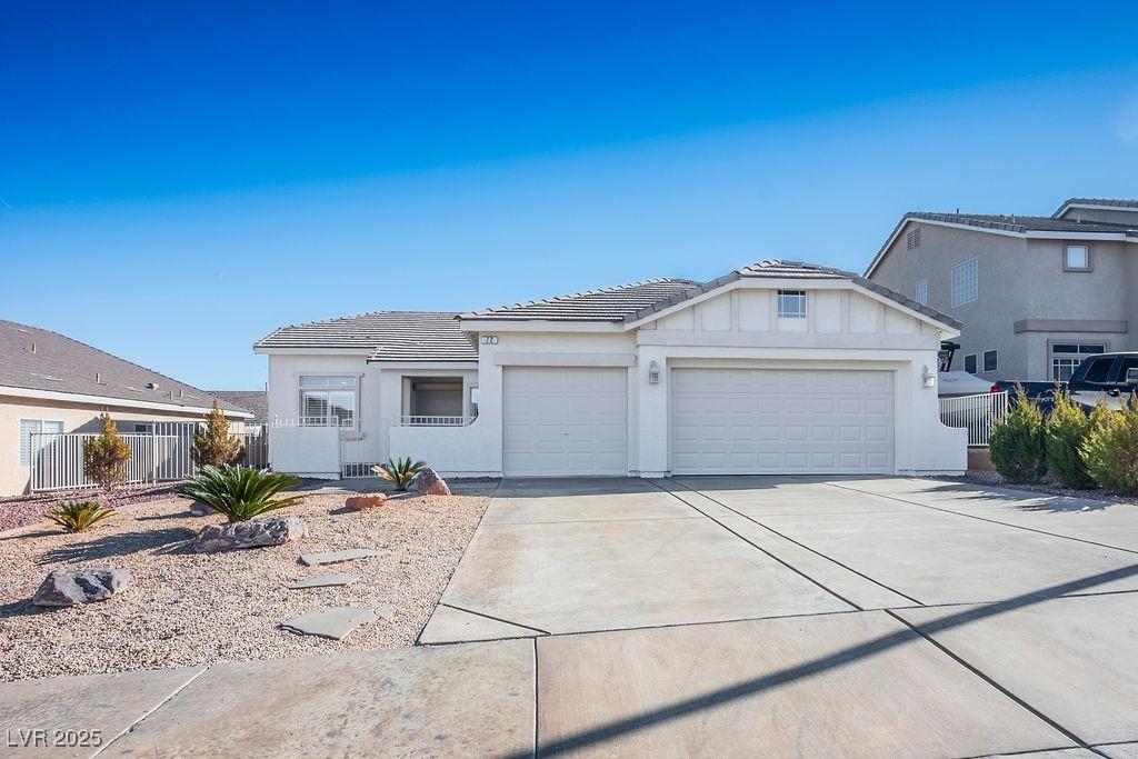 single story home featuring a garage