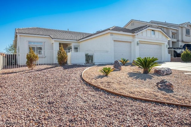 ranch-style home featuring a garage