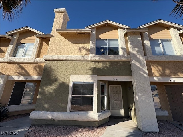 view of front of property featuring stucco siding