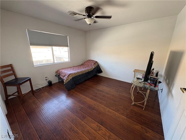 bedroom with wood-type flooring and ceiling fan