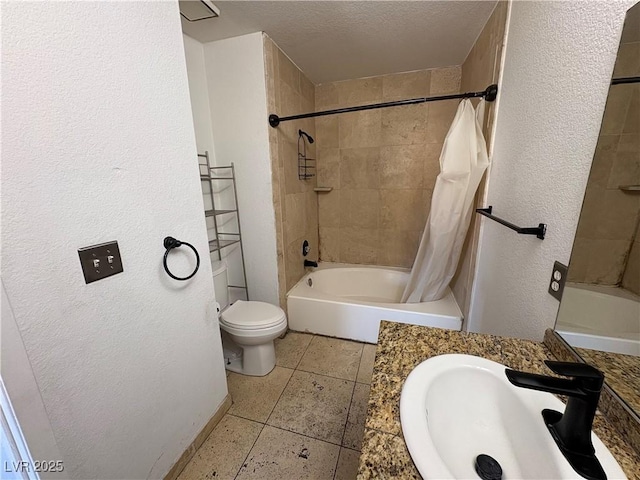 full bathroom with shower / bath combo, a sink, a textured ceiling, toilet, and a textured wall