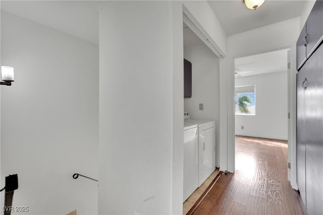 3891 Terrazzo Ave, Las Vegas, NV 89115 - corridor featuring washing machine and dryer and hardwood / wood-style flooring