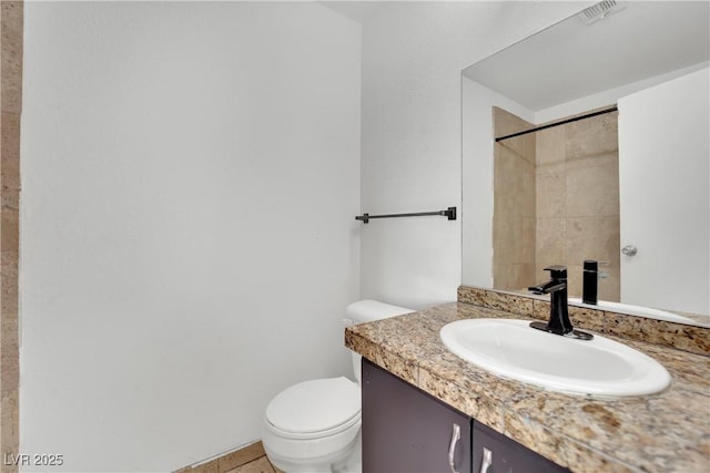 3891 Terrazzo Ave, Las Vegas, NV 89115 - full bathroom with visible vents, toilet, and vanity