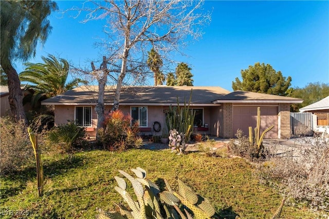 ranch-style home with a garage