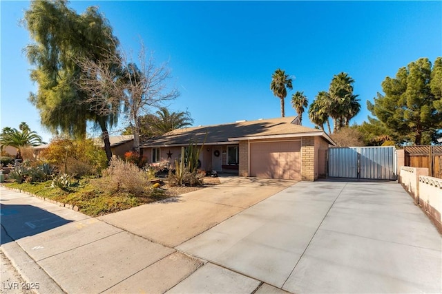 ranch-style home featuring a garage