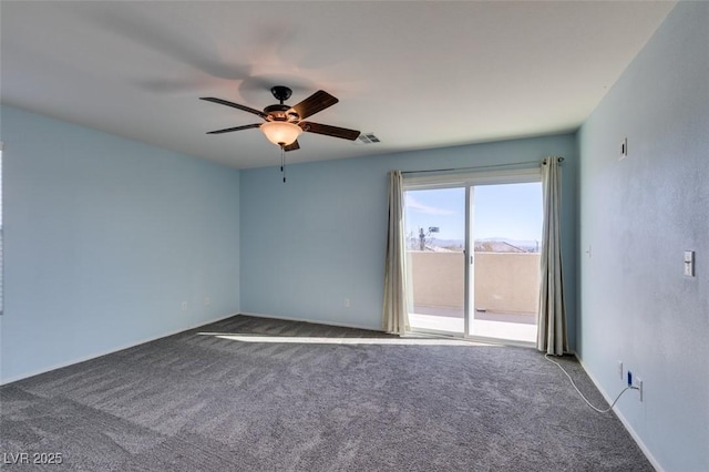 empty room with carpet floors and ceiling fan