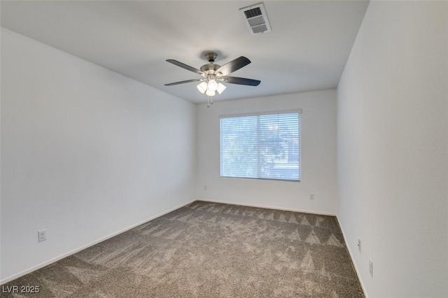 unfurnished room with ceiling fan and carpet floors