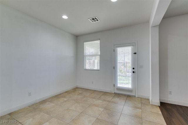 view of tiled spare room