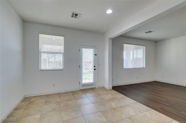 foyer entrance featuring light tile patterned floors