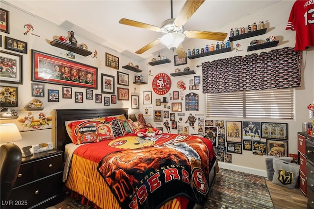 bedroom featuring ceiling fan and wood-type flooring