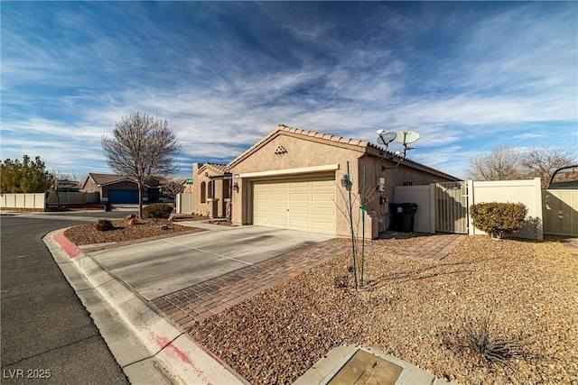 ranch-style house featuring a garage