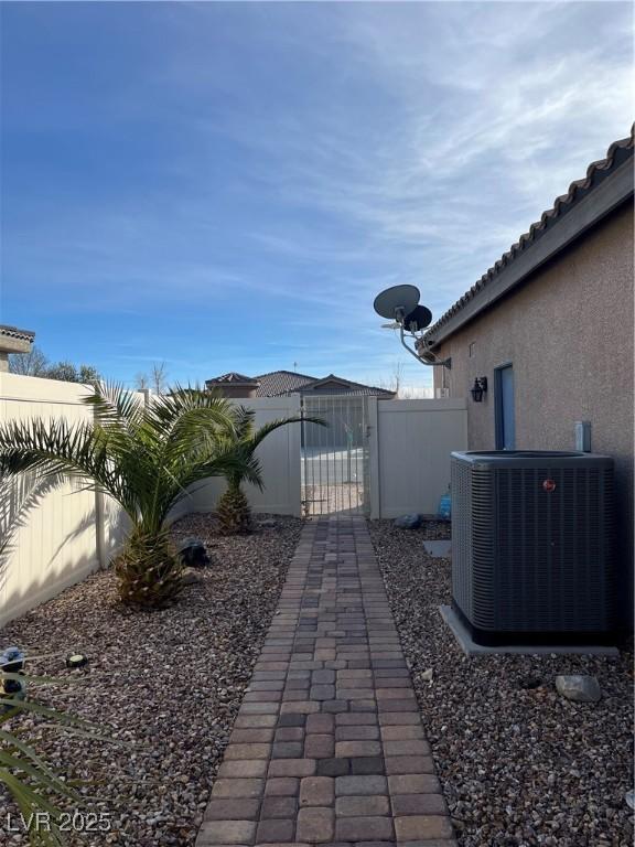 view of yard featuring central AC unit