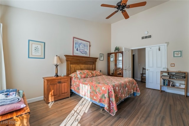 bedroom featuring ceiling fan and hardwood / wood-style floors