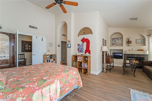 bedroom featuring light wood-type flooring and ceiling fan