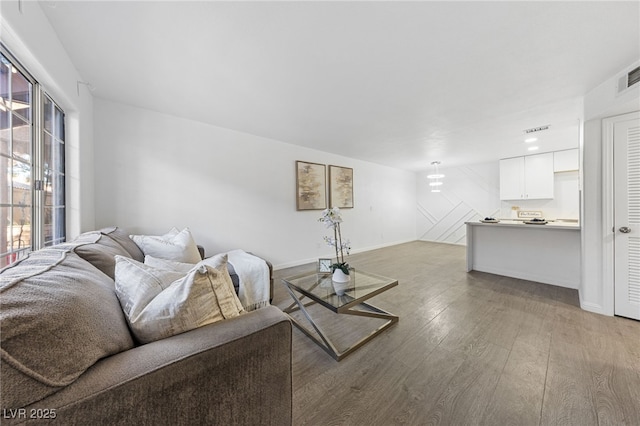 living room with hardwood / wood-style flooring