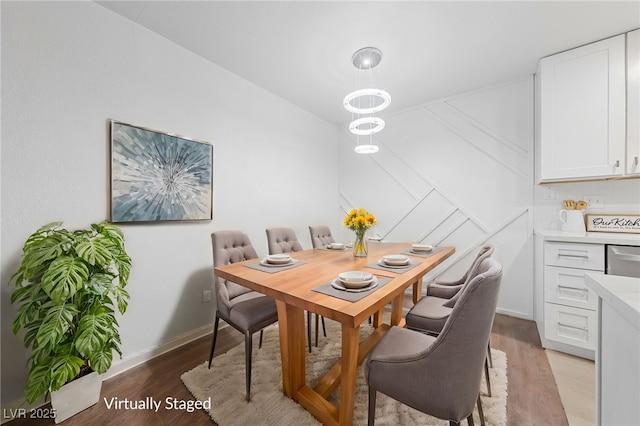 dining room with light hardwood / wood-style flooring