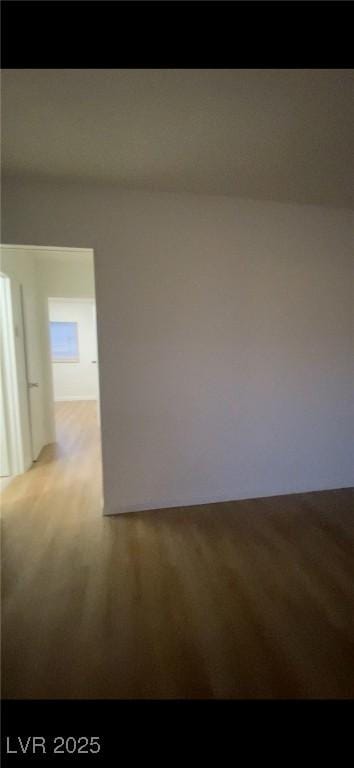 empty room featuring hardwood / wood-style floors