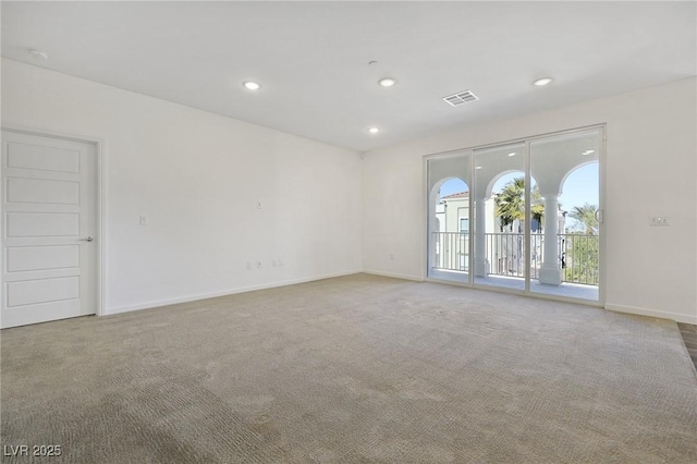 view of carpeted spare room