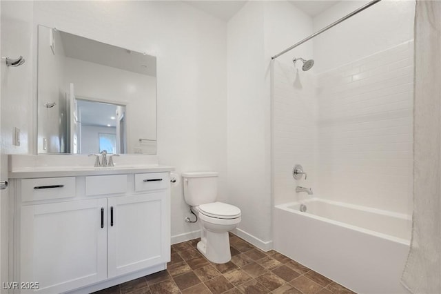 full bathroom featuring vanity, shower / tub combination, and toilet