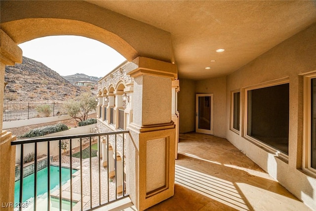 balcony featuring a mountain view