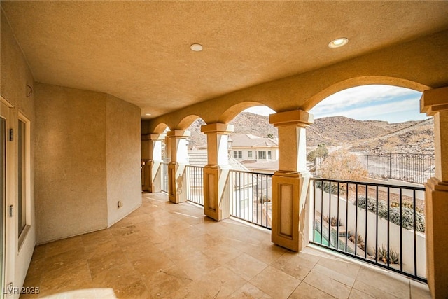 balcony featuring a mountain view