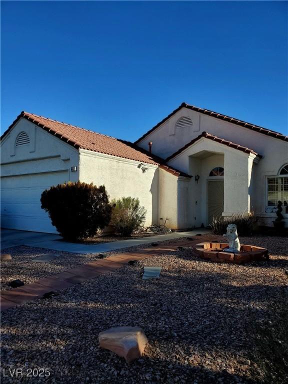 view of property exterior featuring a garage