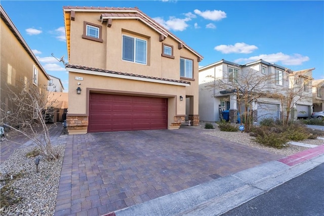 view of front of property featuring a garage