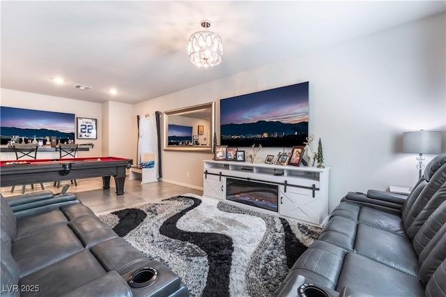 living room featuring a chandelier