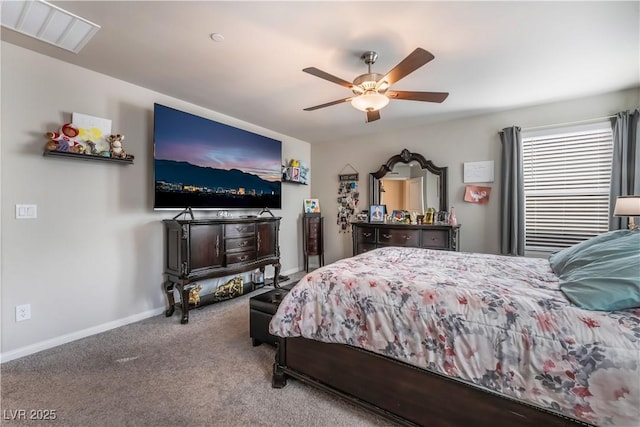 bedroom with ceiling fan and carpet floors