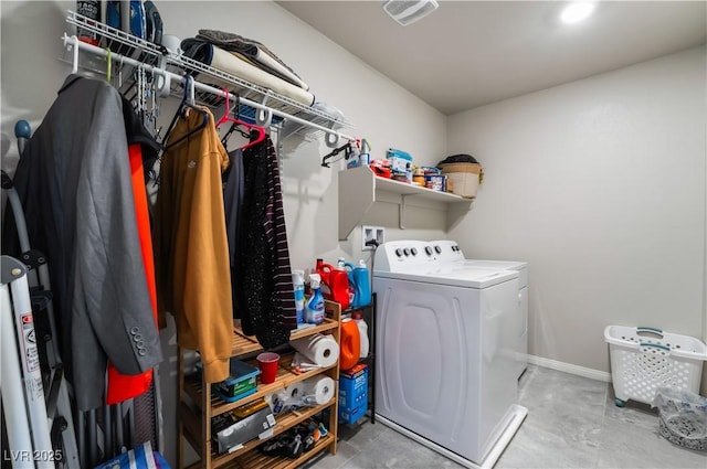 washroom featuring washing machine and dryer