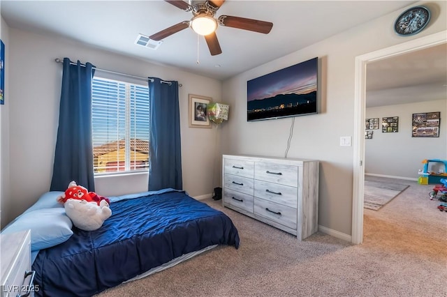 bedroom with light colored carpet and ceiling fan