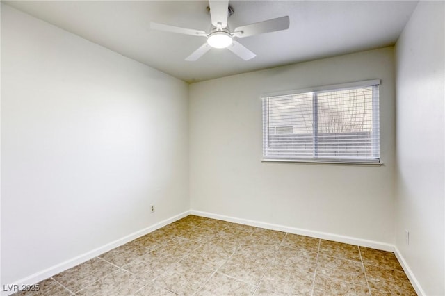 spare room with ceiling fan