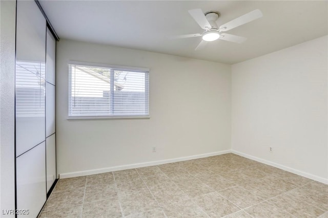 empty room featuring ceiling fan