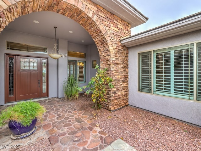 3 Pine Hollow Dr, Henderson, NV 89052 - view of exterior entry with stone siding and stucco siding
