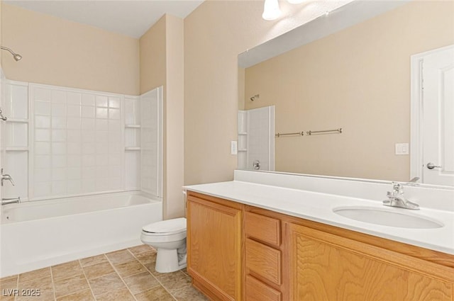 full bathroom featuring vanity, bathtub / shower combination, and toilet